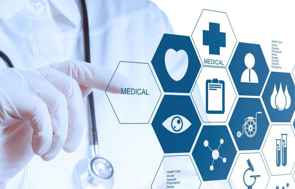 Healthcare professional using medical equipment